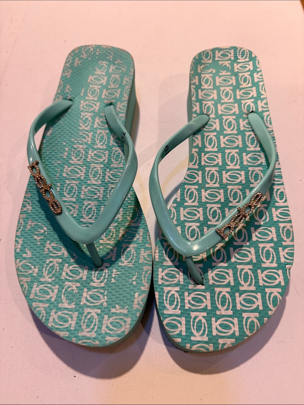 bebe Aqua Patterned Flip Flop Sandals with Gold Logo Accents